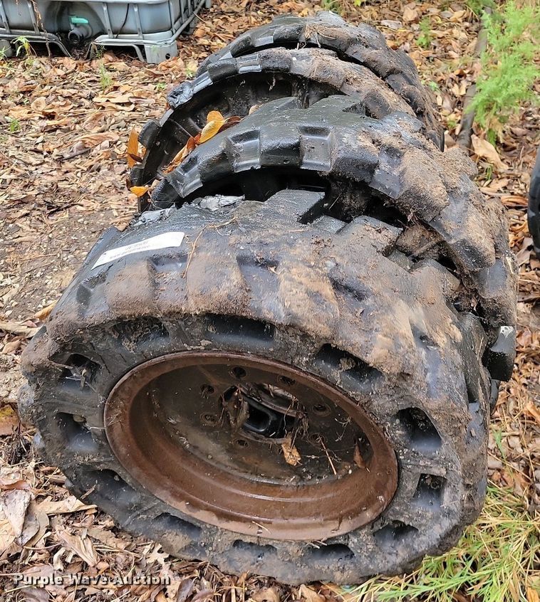 image for item JE9508 (4) 31 x 10-20 solid skid steer tires and wheels