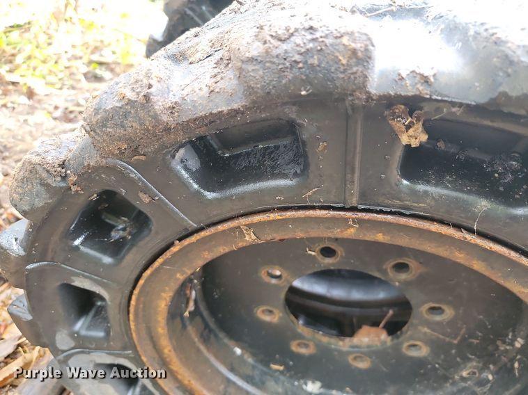 image for item JE9508 (4) 31 x 10-20 solid skid steer tires and wheels