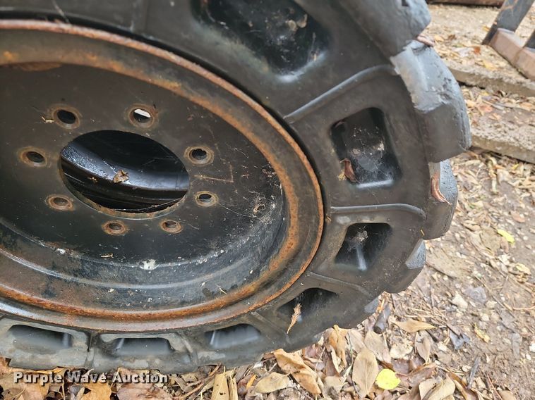 image for item JE9508 (4) 31 x 10-20 solid skid steer tires and wheels