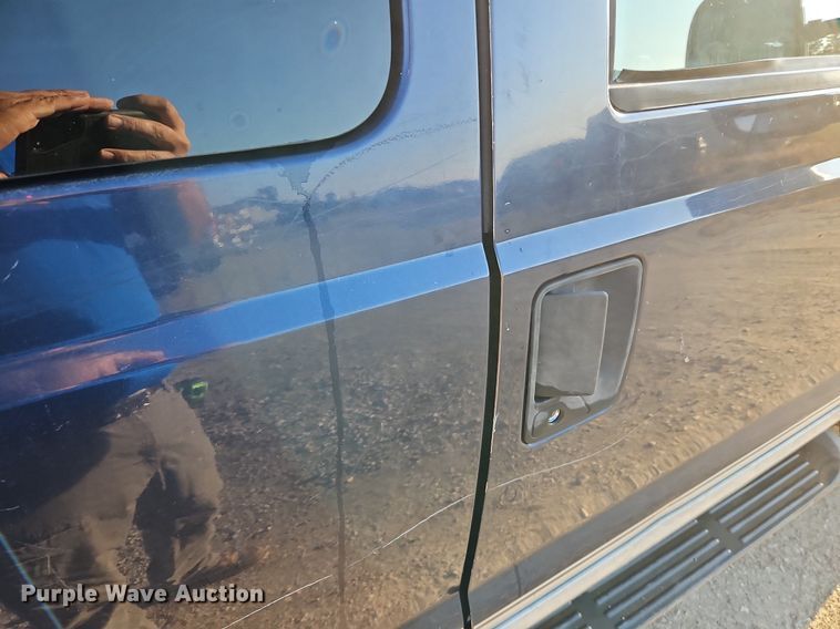 image for item LM9151 2002 Ford F250 Super Duty  SuperCab flatbed pickup truck