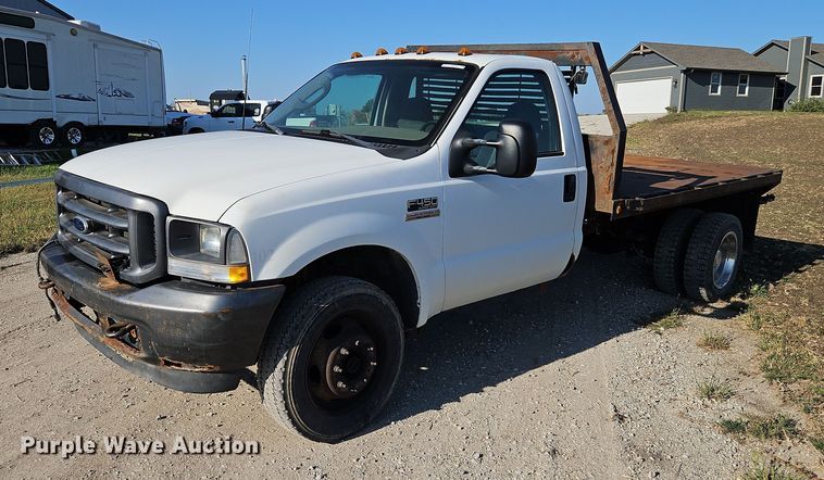 image for item LM9153 2003 Ford F450 Super Duty  dump flatbed truck