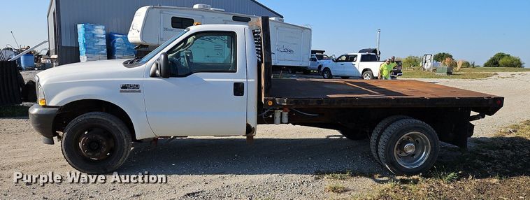 image for item LM9153 2003 Ford F450 Super Duty  dump flatbed truck