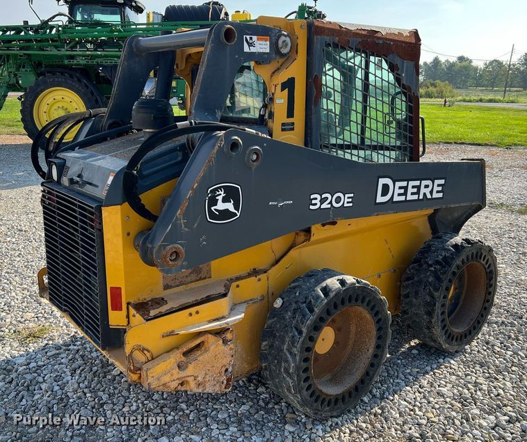 image for item NA9196 2015 John Deere 320E  skid steer loader