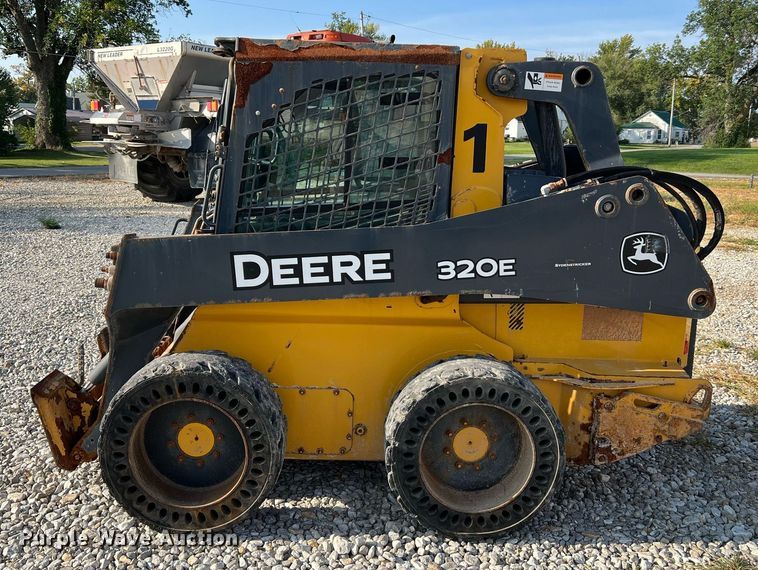 image for item NA9196 2015 John Deere 320E  skid steer loader