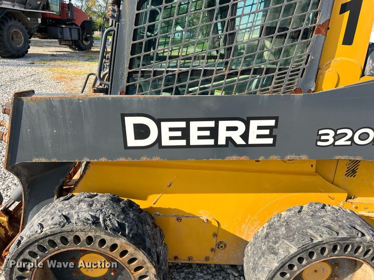 image for item NA9196 2015 John Deere 320E  skid steer loader
