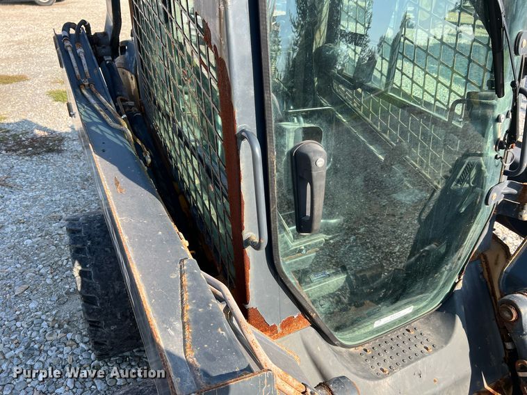 image for item NA9196 2015 John Deere 320E  skid steer loader