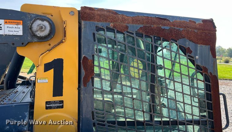 image for item NA9196 2015 John Deere 320E  skid steer loader