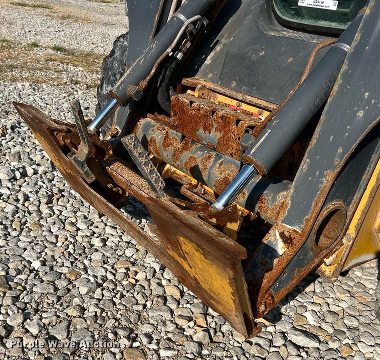 image for item NA9196 2015 John Deere 320E  skid steer loader