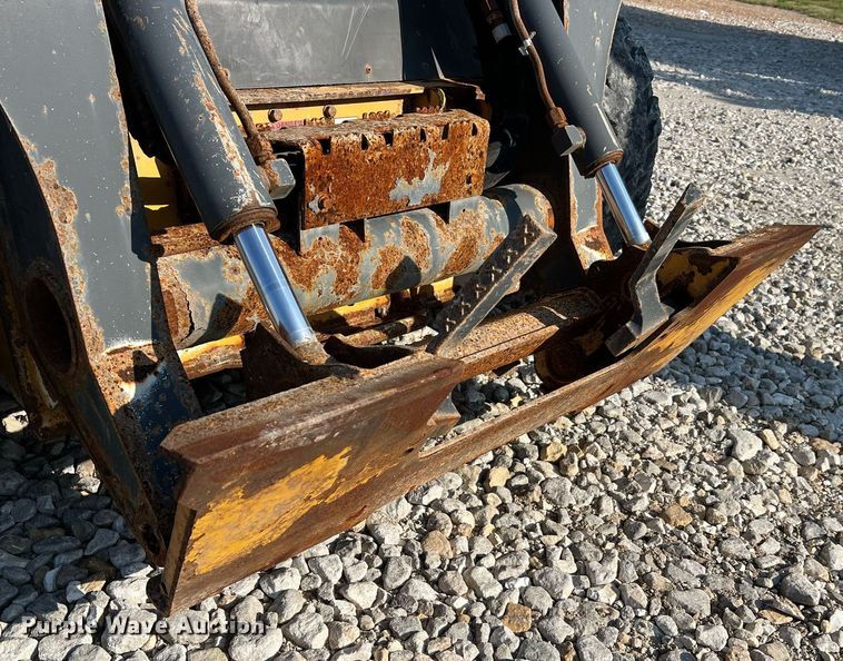 image for item NA9196 2015 John Deere 320E  skid steer loader