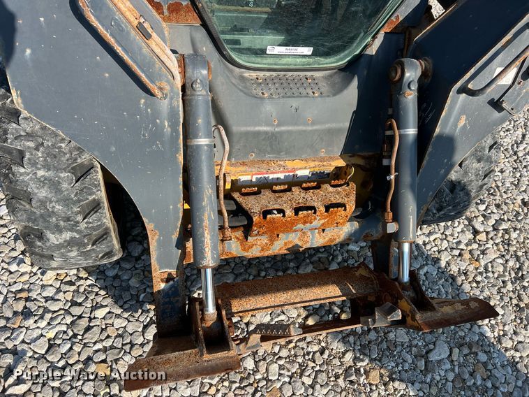 image for item NA9196 2015 John Deere 320E  skid steer loader