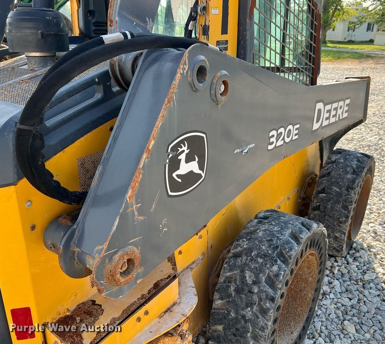 image for item NA9196 2015 John Deere 320E  skid steer loader