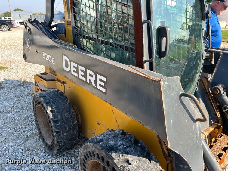 image for item NA9196 2015 John Deere 320E  skid steer loader