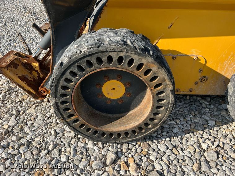 image for item NA9196 2015 John Deere 320E  skid steer loader