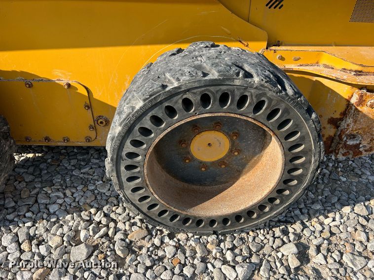 image for item NA9196 2015 John Deere 320E  skid steer loader