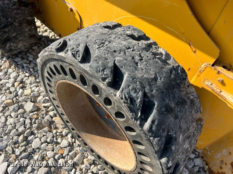 image for item NA9196 2015 John Deere 320E  skid steer loader