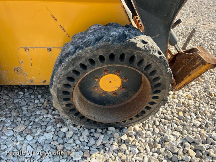 image for item NA9196 2015 John Deere 320E  skid steer loader