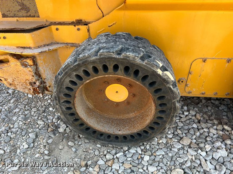 image for item NA9196 2015 John Deere 320E  skid steer loader