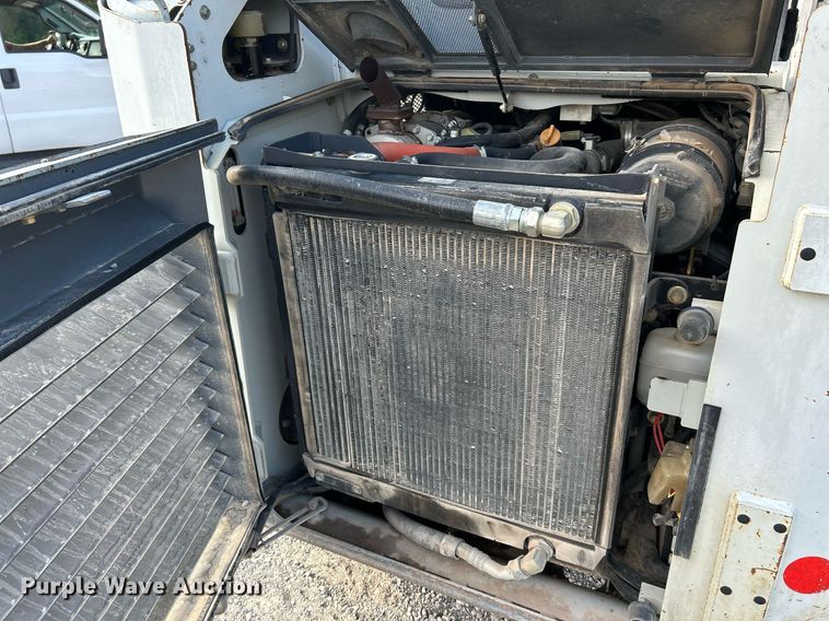 image for item NQ9868 2013 Takeuchi TL12  tracked skid steer loader