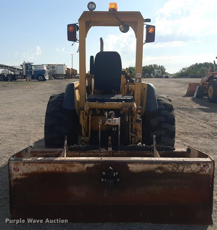 image for item OF9460 2001 John Deere 210LE  landscape tractor