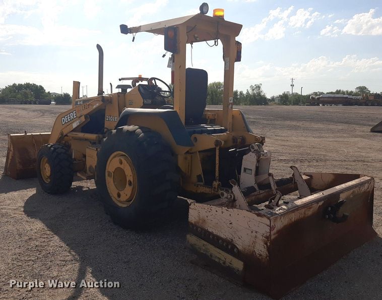 image for item OF9460 2001 John Deere 210LE  landscape tractor