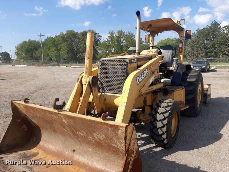 image for item OF9460 2001 John Deere 210LE  landscape tractor
