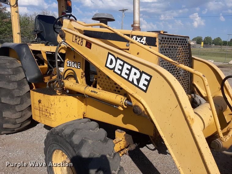 image for item OF9460 2001 John Deere 210LE  landscape tractor