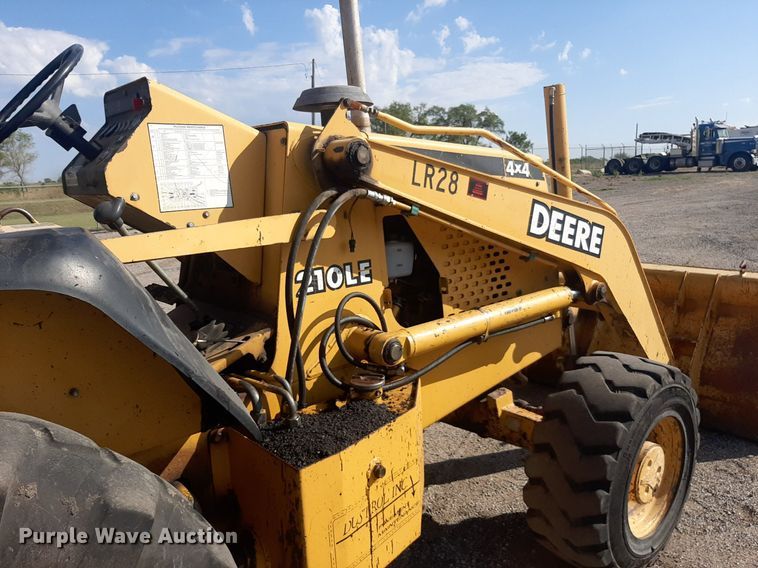 image for item OF9460 2001 John Deere 210LE  landscape tractor