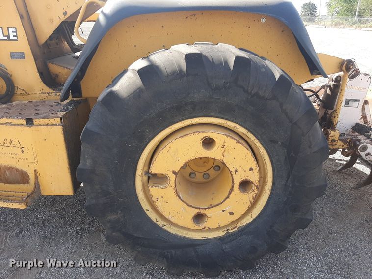 image for item OF9460 2001 John Deere 210LE  landscape tractor