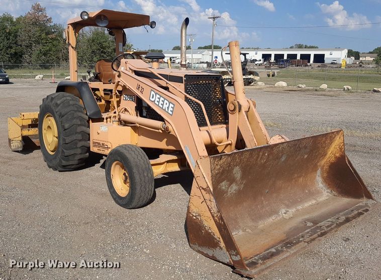 image for item OF9461 2000 John Deere 210LE  landscape tractor