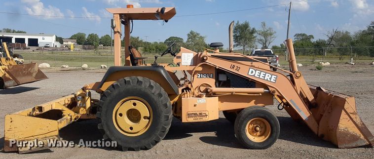 image for item OF9461 2000 John Deere 210LE  landscape tractor