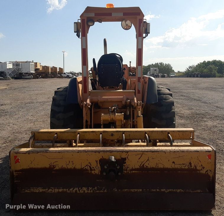 image for item OF9461 2000 John Deere 210LE  landscape tractor