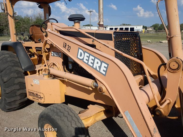 image for item OF9461 2000 John Deere 210LE  landscape tractor