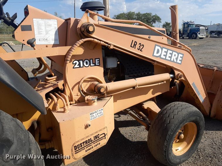 image for item OF9461 2000 John Deere 210LE  landscape tractor