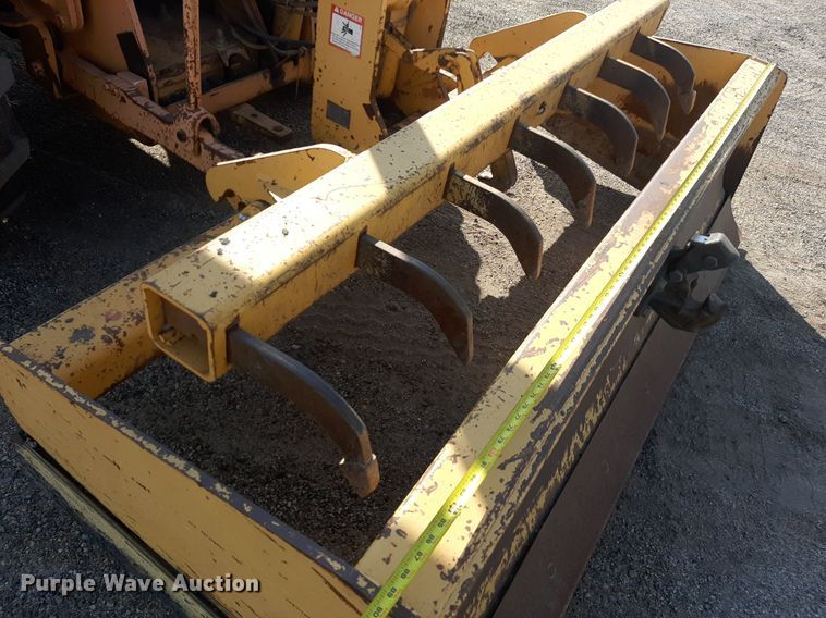 image for item OF9461 2000 John Deere 210LE  landscape tractor