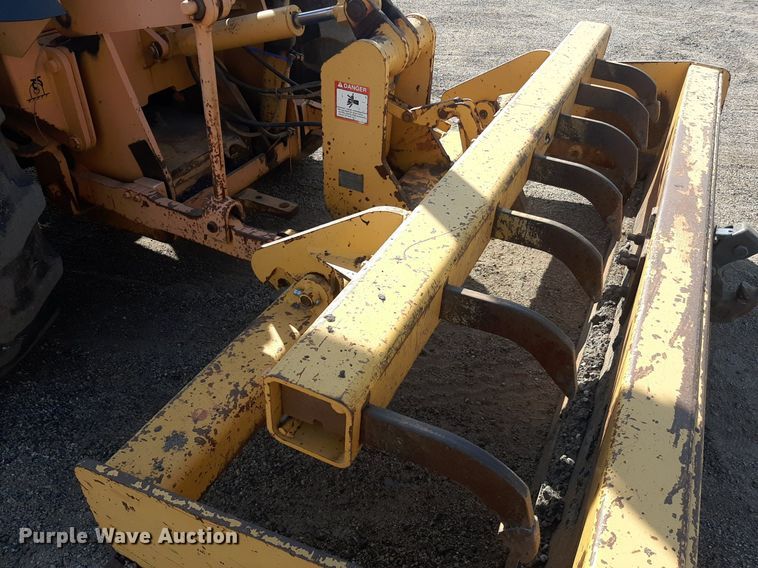 image for item OF9461 2000 John Deere 210LE  landscape tractor