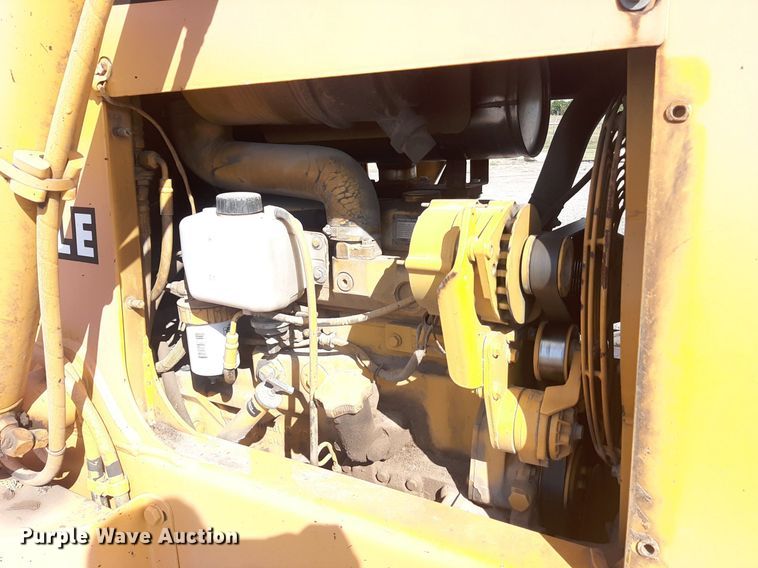 image for item OF9461 2000 John Deere 210LE  landscape tractor