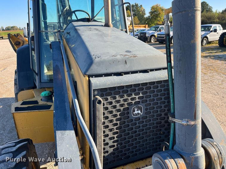 image for item DP2097 2010 John Deere 410J  backhoe