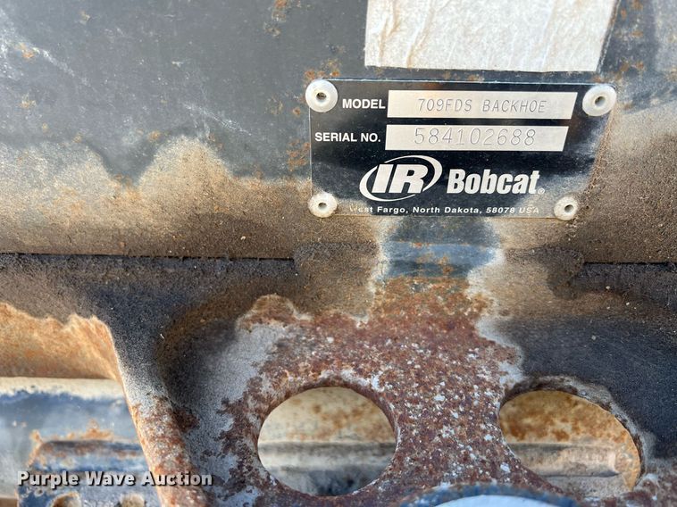 image for item DW2795 Bobcat 709FDS  skid steer backhoe