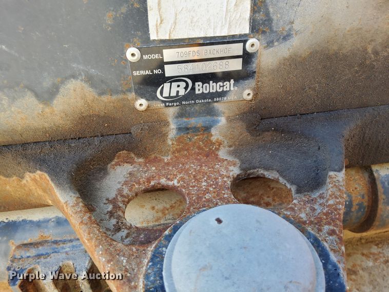 image for item DW2795 Bobcat 709FDS  skid steer backhoe