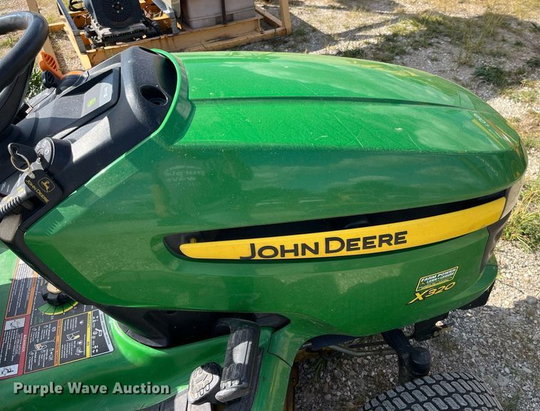image for item MG9497 John Deere X320  lawn mower