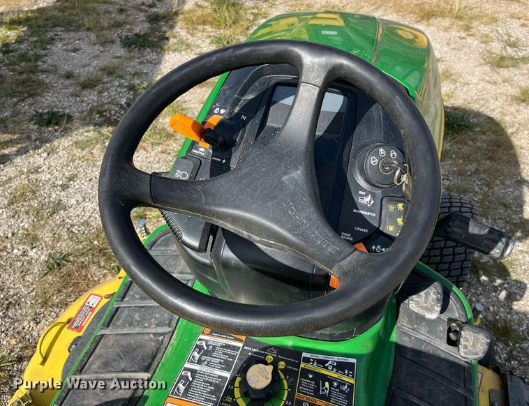 image for item MG9497 John Deere X320  lawn mower