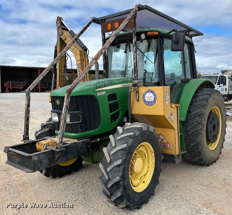 image for item OG9173 2009 John Deere 6330  MFWD tractor