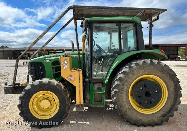 image for item OG9173 2009 John Deere 6330  MFWD tractor