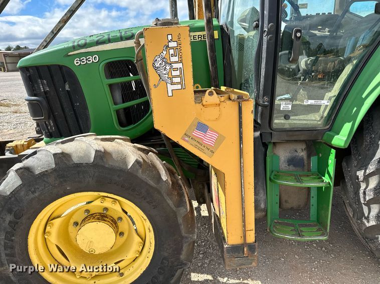 image for item OG9173 2009 John Deere 6330  MFWD tractor