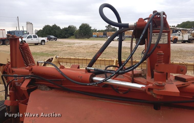 image for item OF9514 New Holland 116  swather / windrower