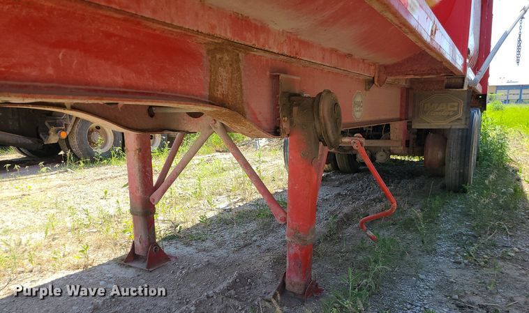 image for item MO9903 2012 MAC  end dump trailer