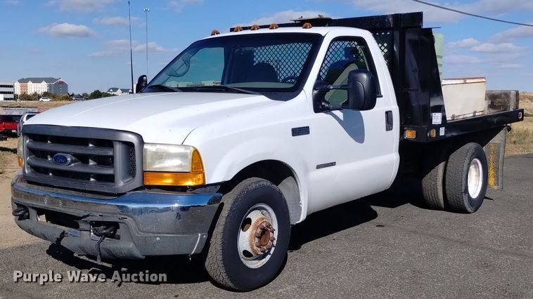 image for item DK8844 2000 Ford F350 Super Duty XL  flatbed pickup truck