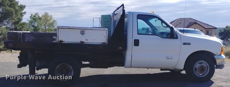 image for item DK8844 2000 Ford F350 Super Duty XL  flatbed pickup truck