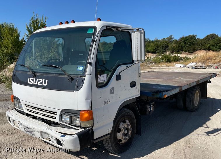 image for item DM0374 2002 Isuzu NPR  flatbed truck