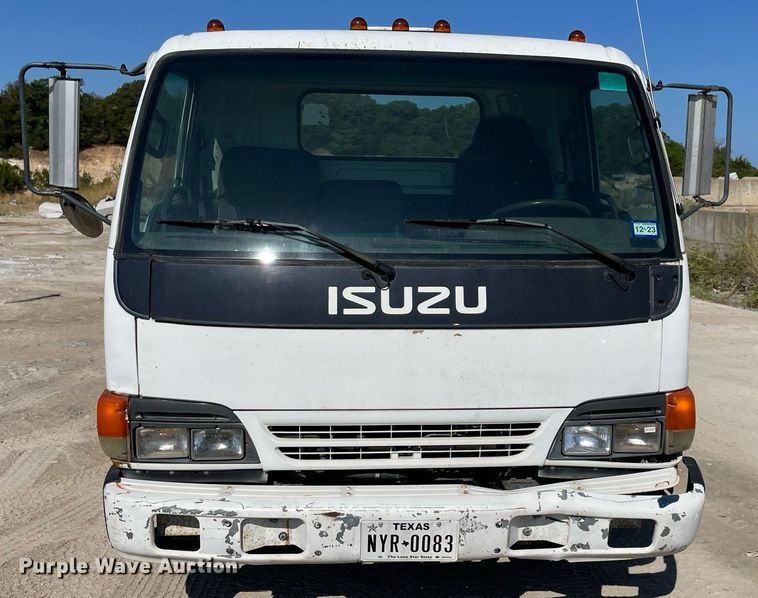 image for item DM0374 2002 Isuzu NPR  flatbed truck